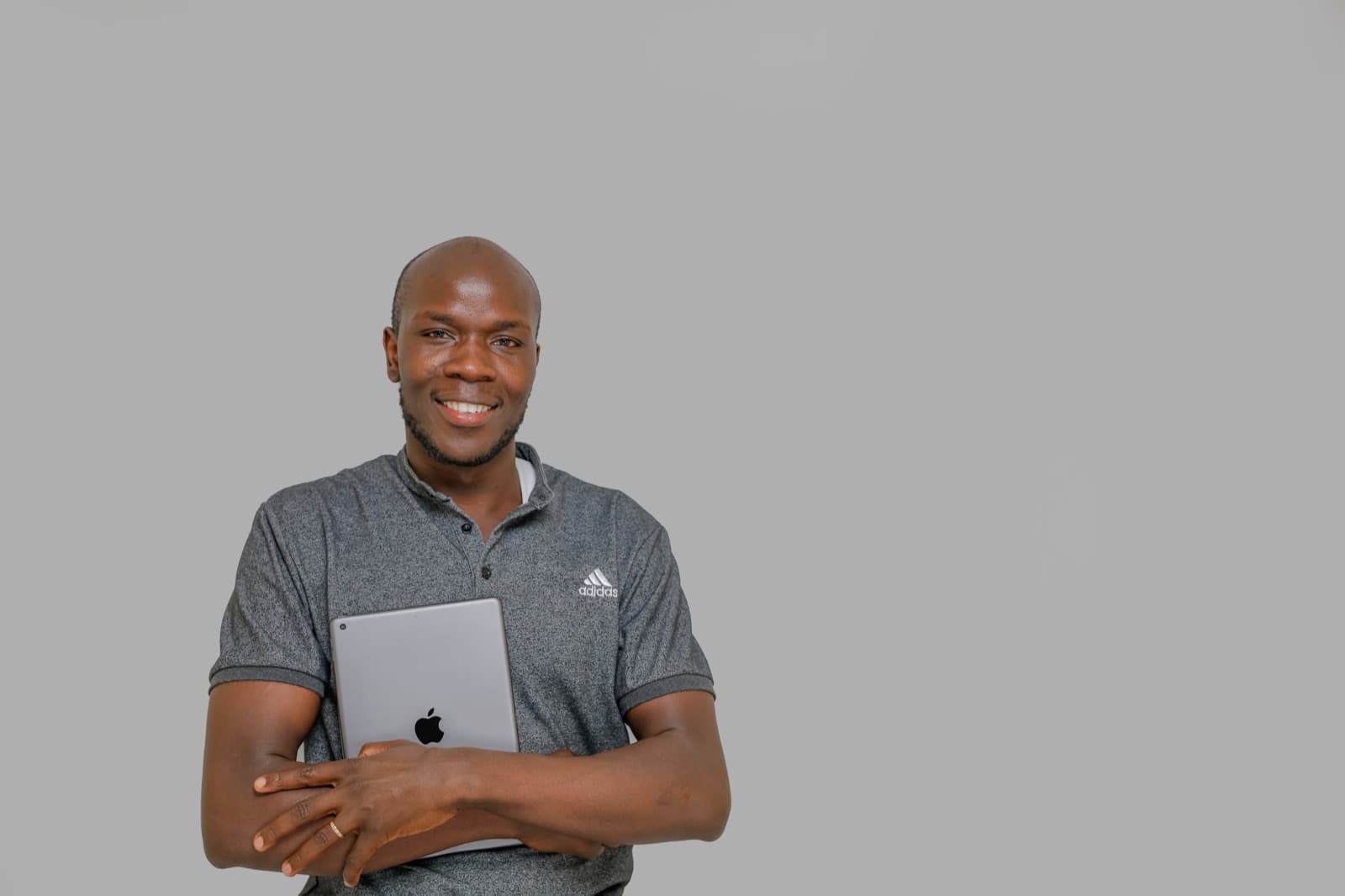 African business owner reviewing his shop dashboard on a tablet